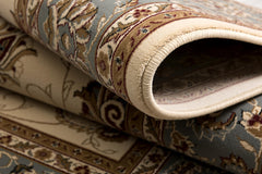 8’ x 11’ Cream and Blue Traditional Area Rug