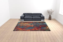 9' x 12' Blue and Orange Abstract Power Loom Area Rug