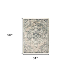 5' x 8' Beige and Blue Medallion Power Loom Area Rug