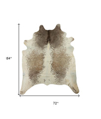 6' x 7' Brown and White Cowhide Hand Knotted Area Rug