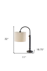 32" Antiqued Bronze Metal Adjustable Cylinder Arched Table Lamp With Beige Drum Shade