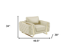 50" Beige and Silver Faux Leather Tufted Arm Chair