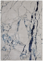 7' x 10' Ivory and Blue Marble Power Loom Distressed Area Rug