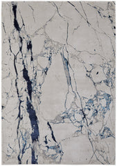 7' x 10' Ivory and Blue Marble Power Loom Distressed Area Rug