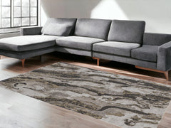 8' x 10' Brown and Ivory Abstract Power Loom Distressed Area Rug