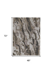 4' x 6' Brown and Ivory Abstract Power Loom Distressed Area Rug