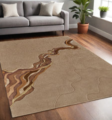 5' x 8' Beige and Brown Abstract Hand Tufted Area Rug