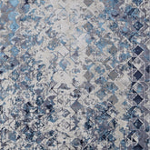 2' x 3' Blue and Ivory Abstract Power Loom Distressed Area Rug