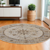 8' Brown and Ivory Round Oriental Power Loom Distressed Area Rug