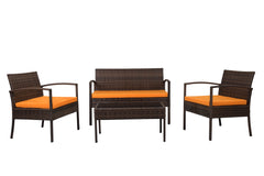 Four Piece Outdoor Brown Wicker Sofa Seating Group with Orange Cushions