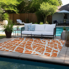 5' X 8' Orange and White Abstract Washable Non Skid Indoor Outdoor Area Rug