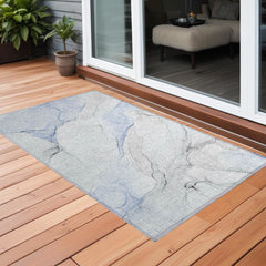 3' X 4' Ivory Blue and Gray Abstract Washable Non Skid Indoor Outdoor Area Rug