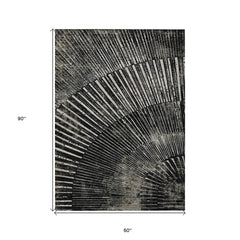 5' X 8' Black and Ivory Abstract Washable Non Skid Indoor Outdoor Area Rug