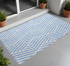 3' X 5' Blue and Ivory Geometric Washable Non Skid Indoor Outdoor Area Rug