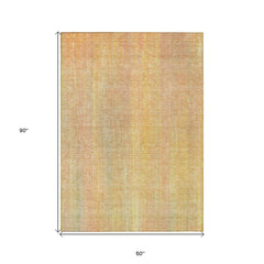 5' X 8' Yellow and Orange Striped Washable Non Skid Indoor Outdoor Area Rug