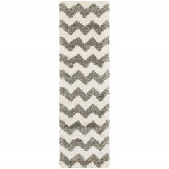 2' X 8' Grey And Ivory Geometric Shag Power Loom Stain Resistant Runner Rug