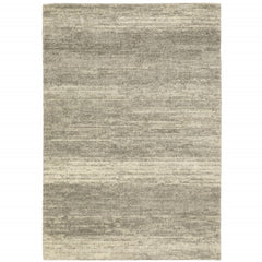 10' X 13' Grey Beige And Tan Abstract Power Loom Stain Resistant Area Rug