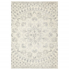 10' X 13' Ivory And Grey Floral Power Loom Stain Resistant Area Rug