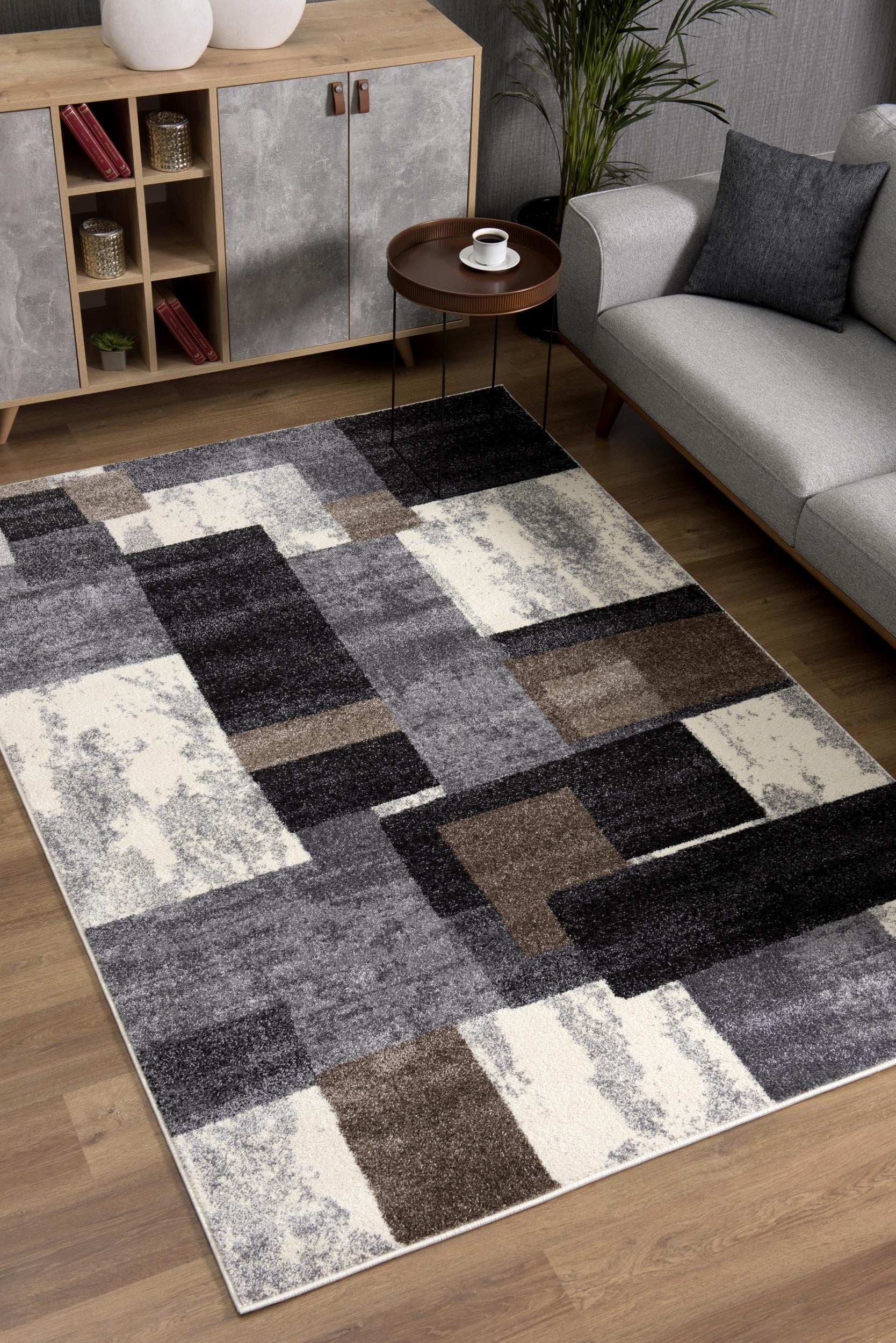 7’ X 9’ Brown Distressed Geometric Area Rug