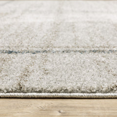 7' X 10' Grey Teal Beige And Tan Geometric Power Loom Area Rug