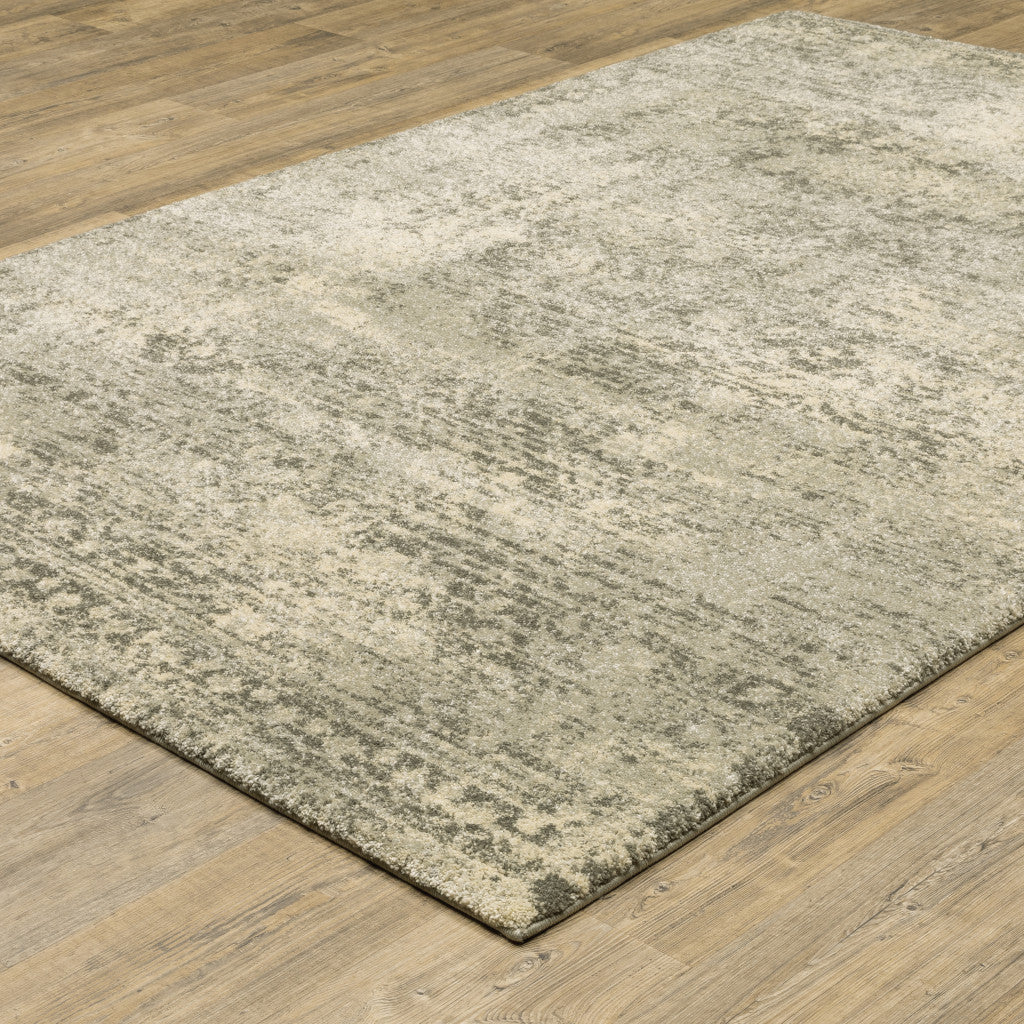 6' X 9' Grey Ivory Beige And Taupe Oriental Power Loom Stain Resistant Area Rug