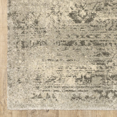 6' X 9' Grey Ivory Beige And Taupe Oriental Power Loom Stain Resistant Area Rug