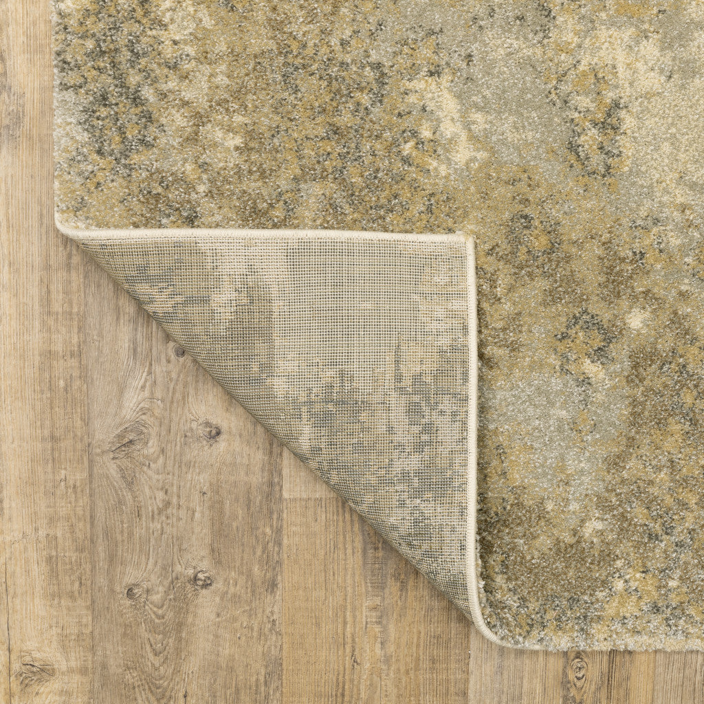 4' x 5' Beige and Gold Abstract Power Loom Area Rug