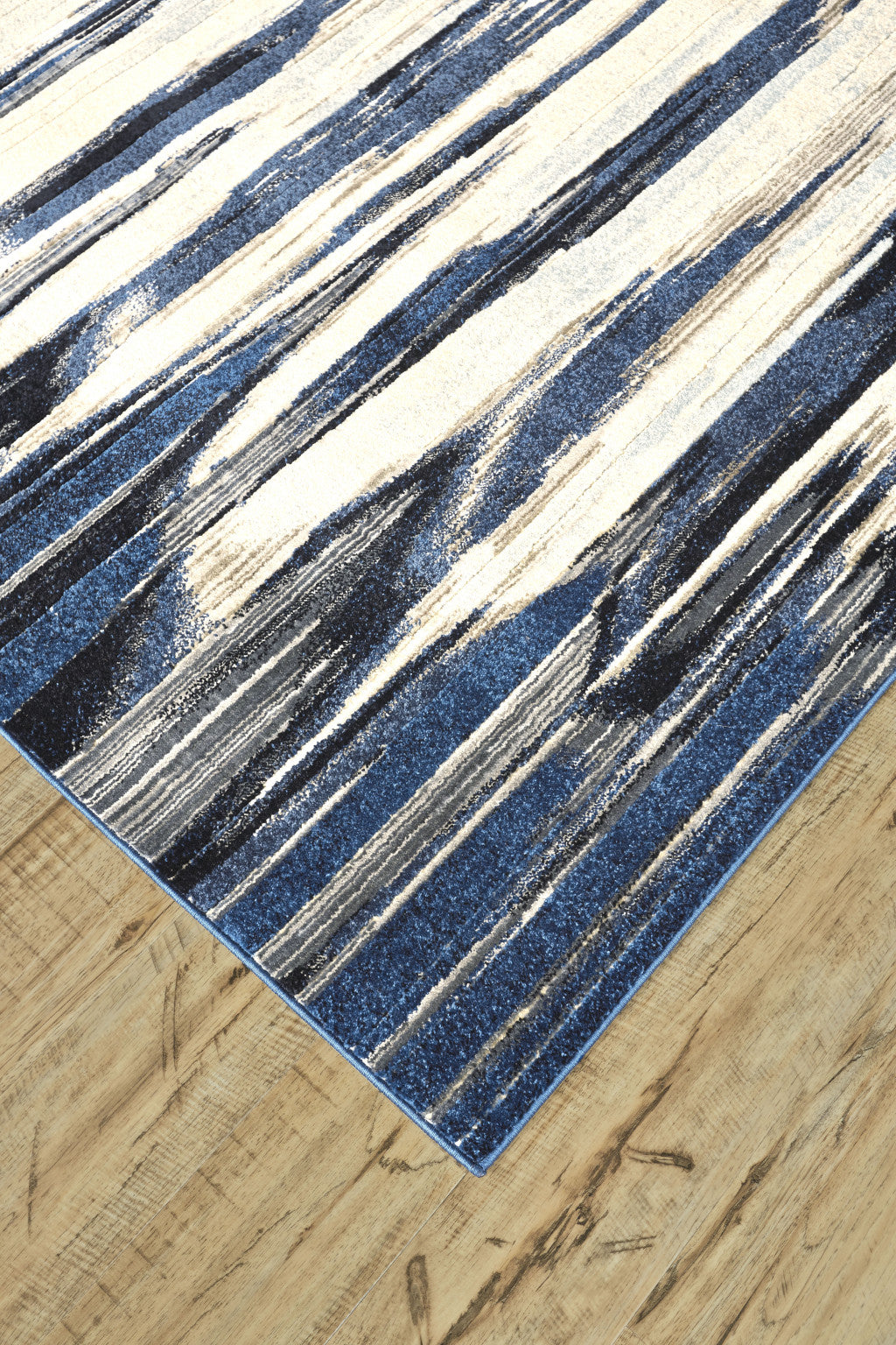 5' X 8' Ivory Blue And Gray Abstract Distressed Area Rug