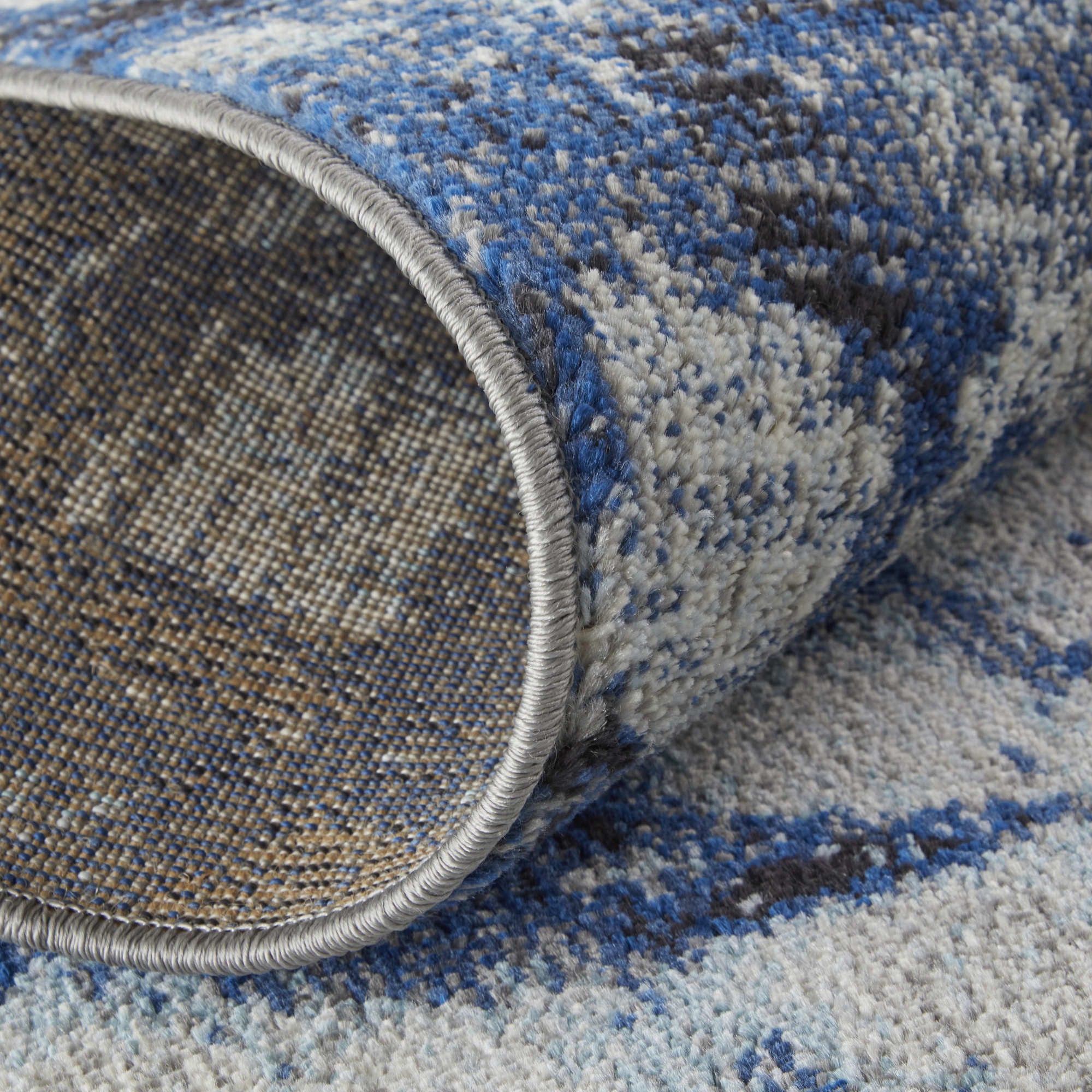 8' Blue and Ivory Abstract Power Loom Distressed Runner Rug