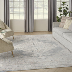 9' X 12' Light Blue Oriental Power Loom Distressed Area Rug