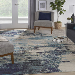 10' x 14' Ivory Abstract Power Loom Area Rug