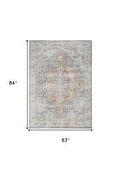 5' x 7' Denim Blue Oriental Power Loom Washable Area Rug