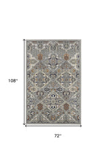 6' x 9' Green and Ivory Floral Power Loom Area Rug