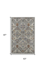 5' x 7' Green and Ivory Floral Power Loom Area Rug