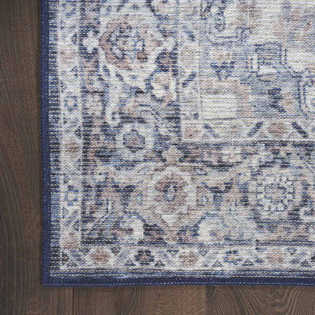 6' X 9' Blue And Pink Floral Power Loom Distressed Washable Area Rug