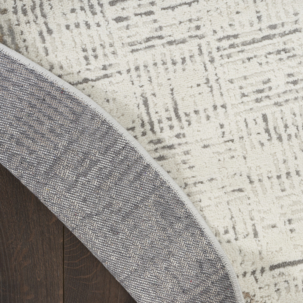 8' Ivory Round Abstract Power Loom Area Rug