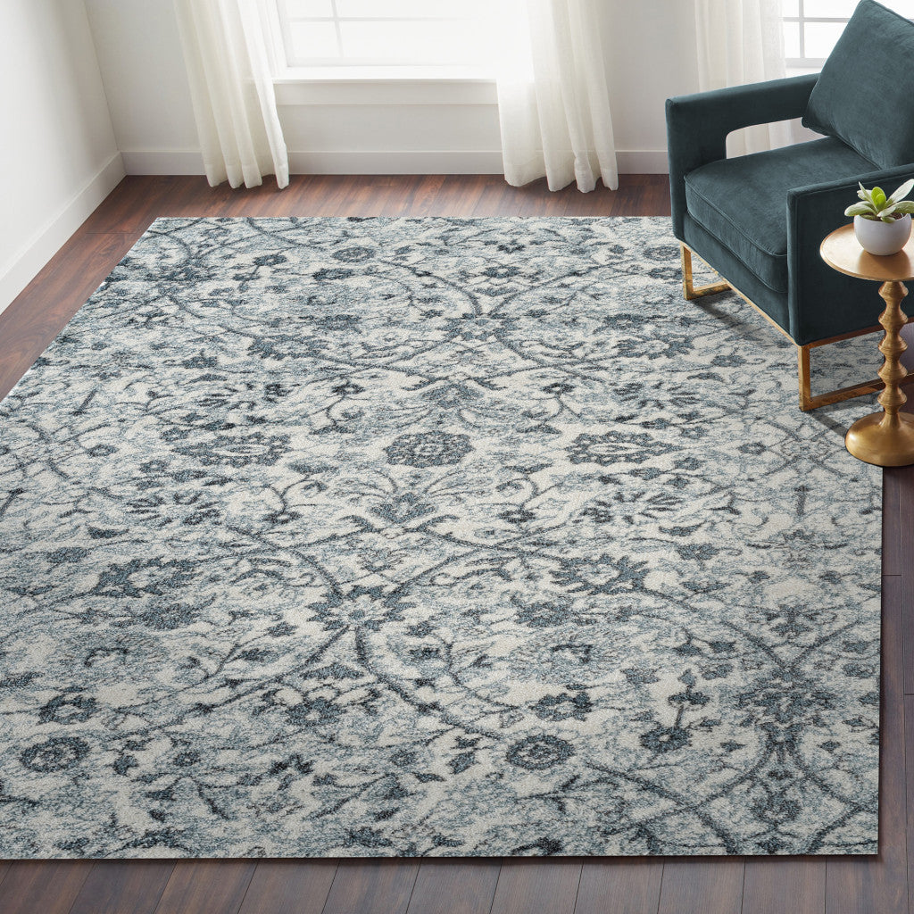 4' x 6' Light Blue Floral Power Loom Area Rug