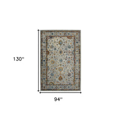 8' x 11' Orange and Ivory Floral Power Loom Area Rug