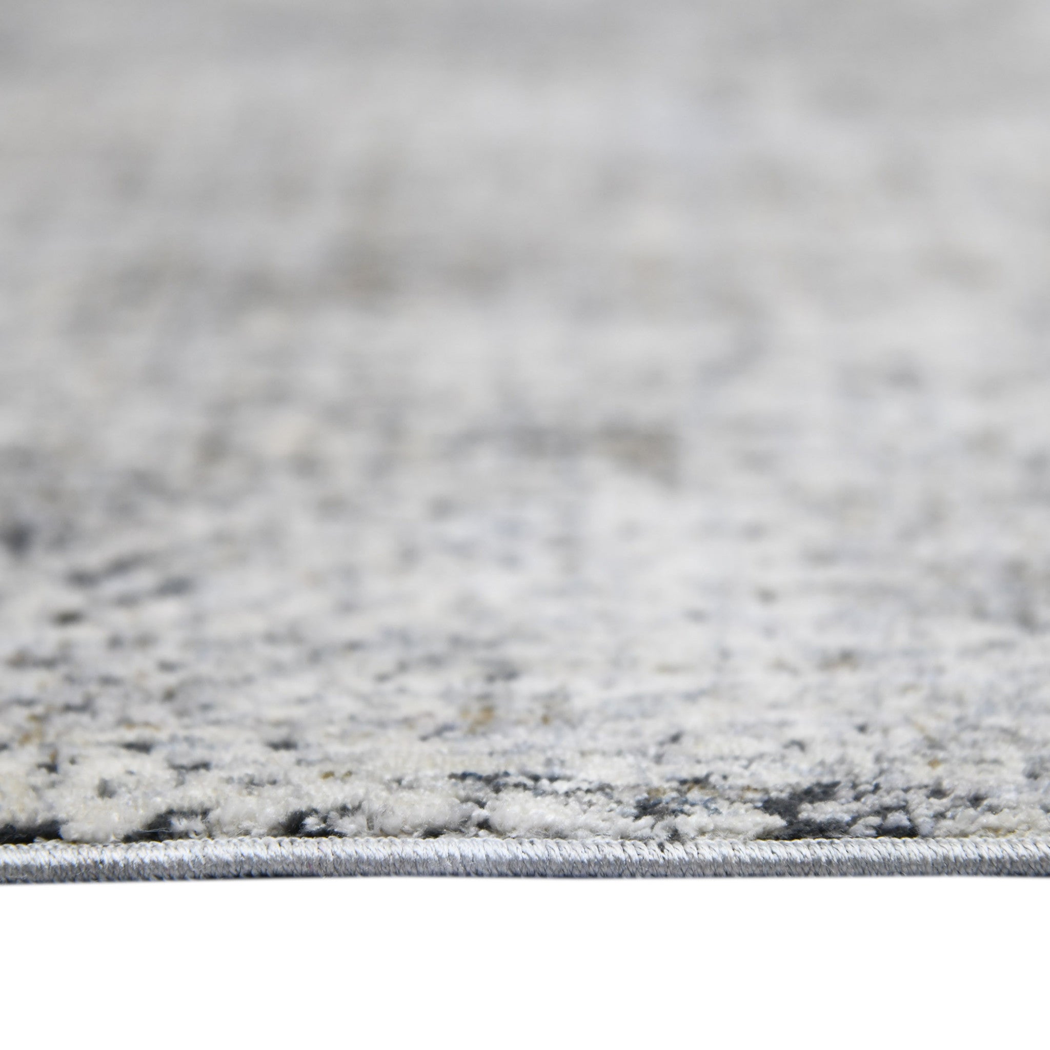 2' x 3' Gray and Ivory Abstract Power Loom Area Rug