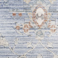 8' x 10' Blue and Ivory Oriental Power Loom Distressed Area Rug With Fringe