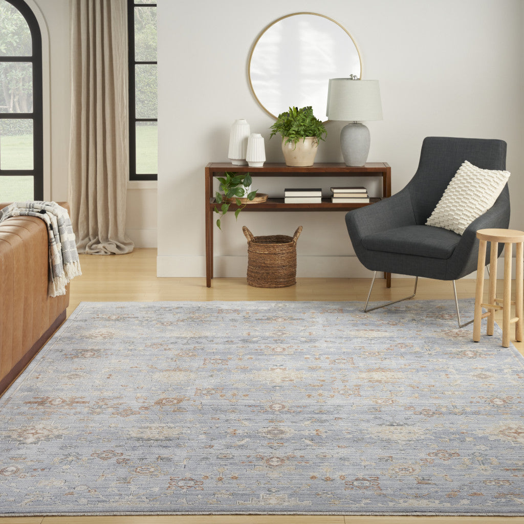 8' x 10' Blue and Ivory Oriental Power Loom Distressed Area Rug With Fringe