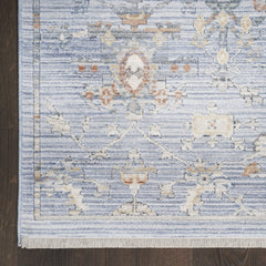 8' x 10' Blue and Ivory Oriental Power Loom Distressed Area Rug With Fringe