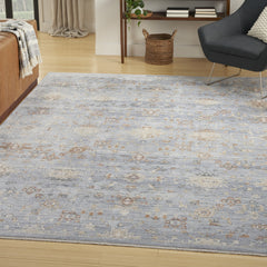 8' x 10' Blue and Ivory Oriental Power Loom Distressed Area Rug With Fringe