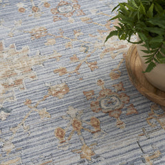 8' x 10' Blue and Ivory Oriental Power Loom Distressed Area Rug With Fringe