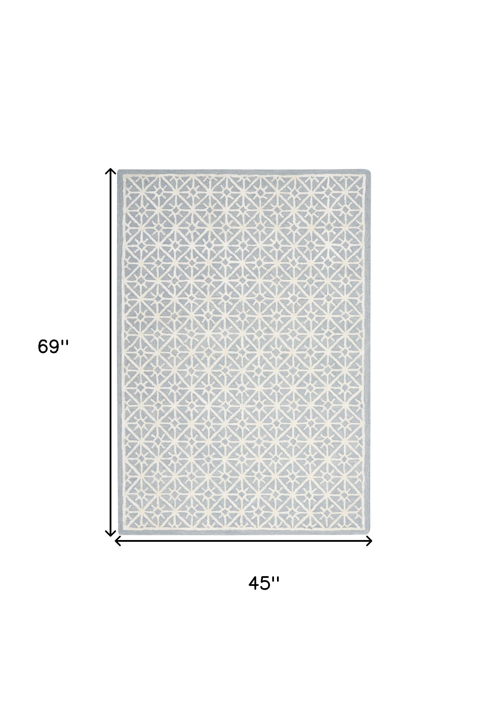 4' x 6' Light Blue and White Geometric Hand Tufted Area Rug