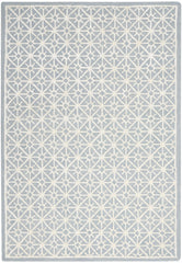 4' x 6' Light Blue and White Geometric Hand Tufted Area Rug