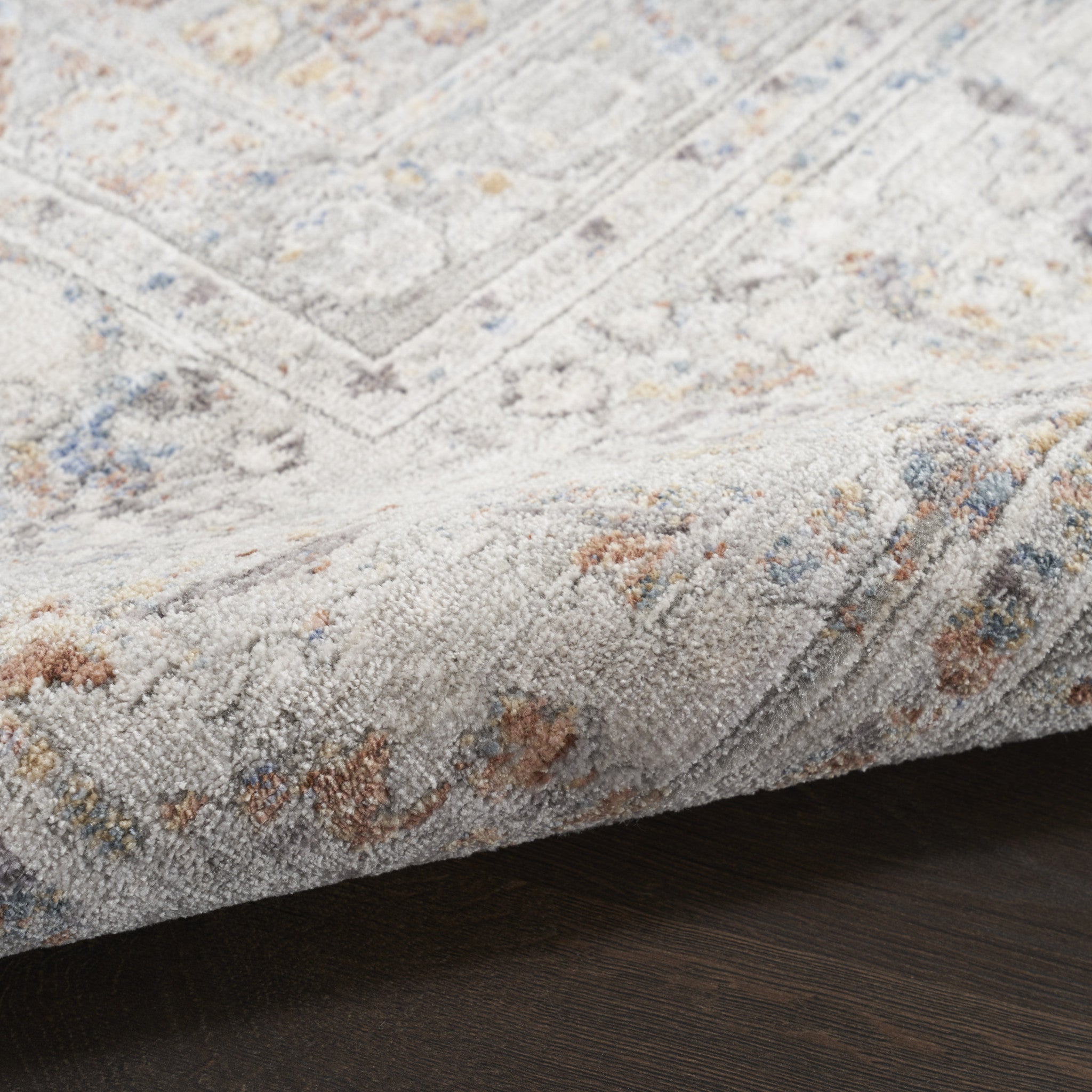 5' x 8' Ivory and Blue Oriental Power Loom Distressed Area Rug With Fringe