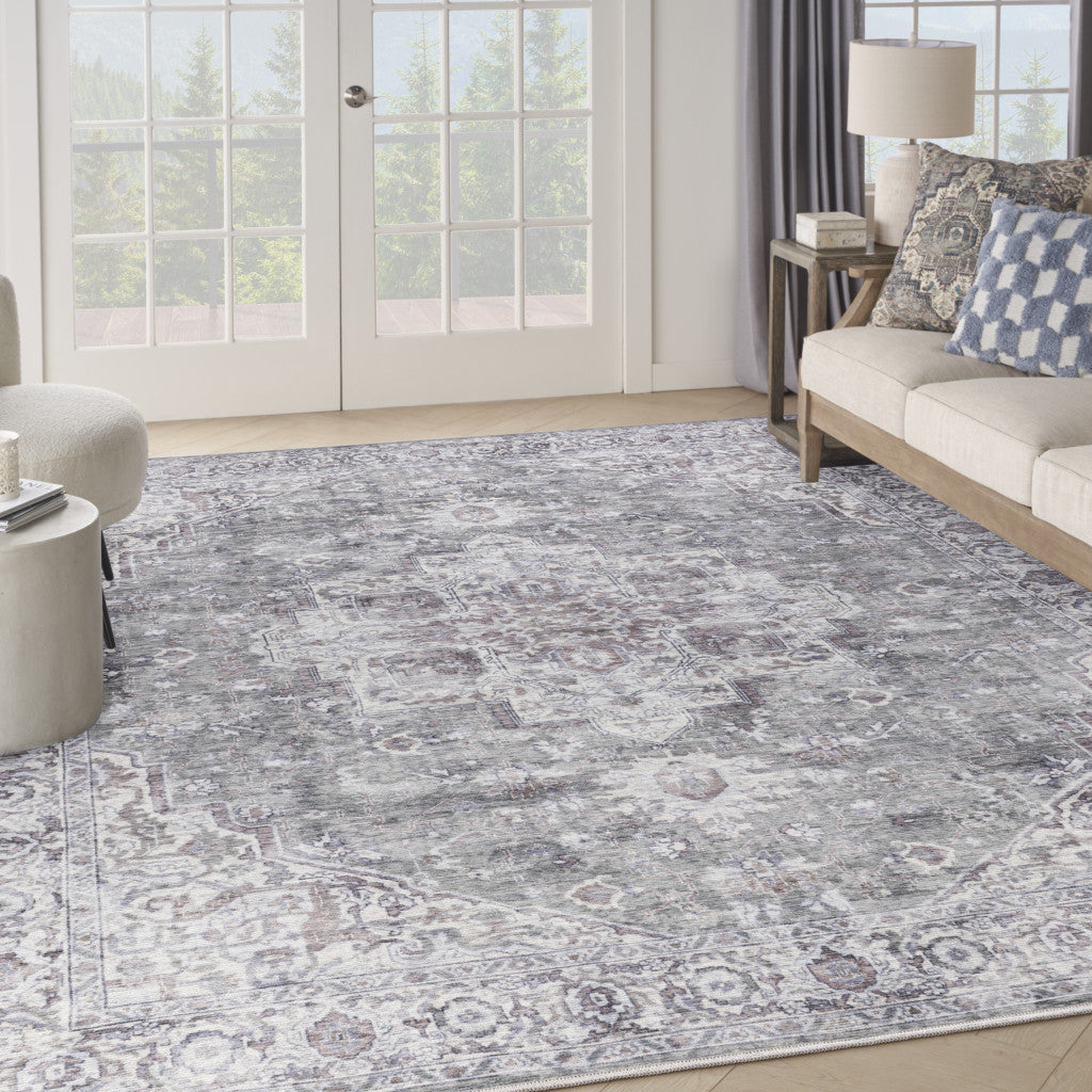 9' x 12' Gray and Ivory Floral Power Loom Distressed Washable Area Rug