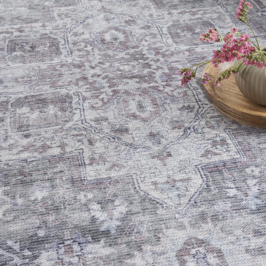 9' x 12' Gray and Ivory Floral Power Loom Distressed Washable Area Rug