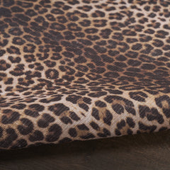 8' x 10' Brown and Ivory Leopard Print Power Loom Washable Non Skid Area Rug